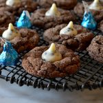 chocolate cookies and cream cookies on wire rack