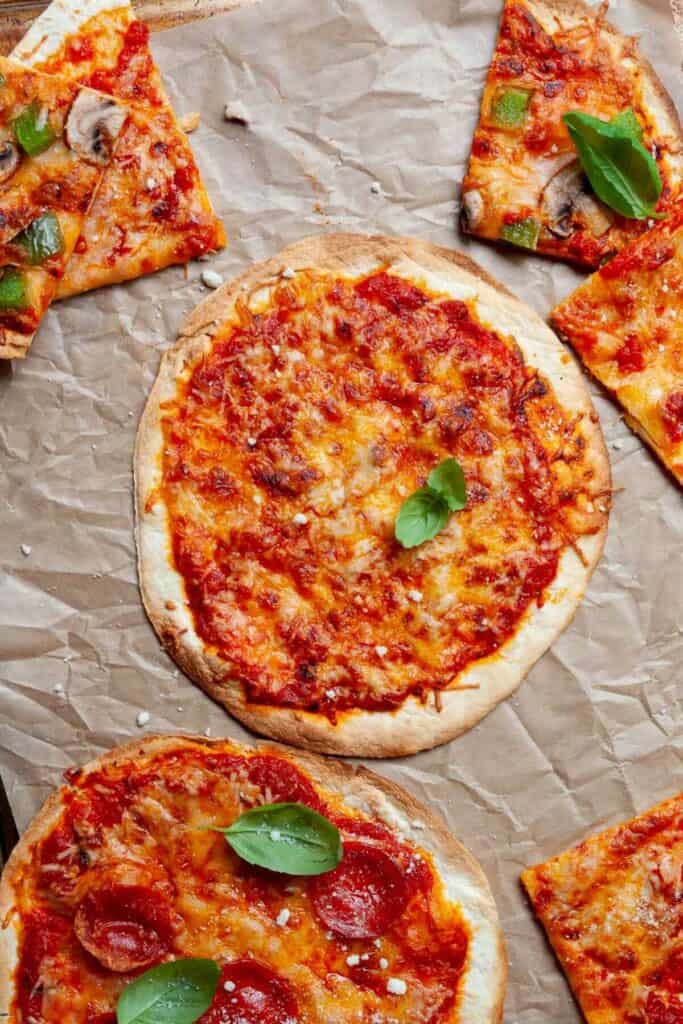 air fryer tortilla pizza with fresh basil and parmesan cheese